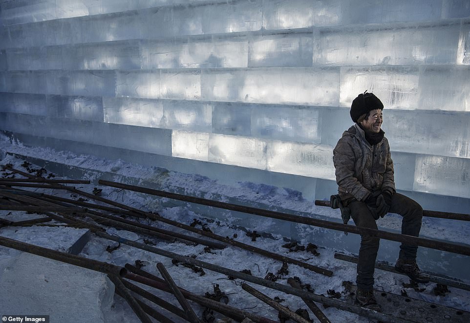 7894968-6535251-image-a-63_1545996948211 Finally done: Workers effort will be appreciated when the park official opens its doors to people around the world next week