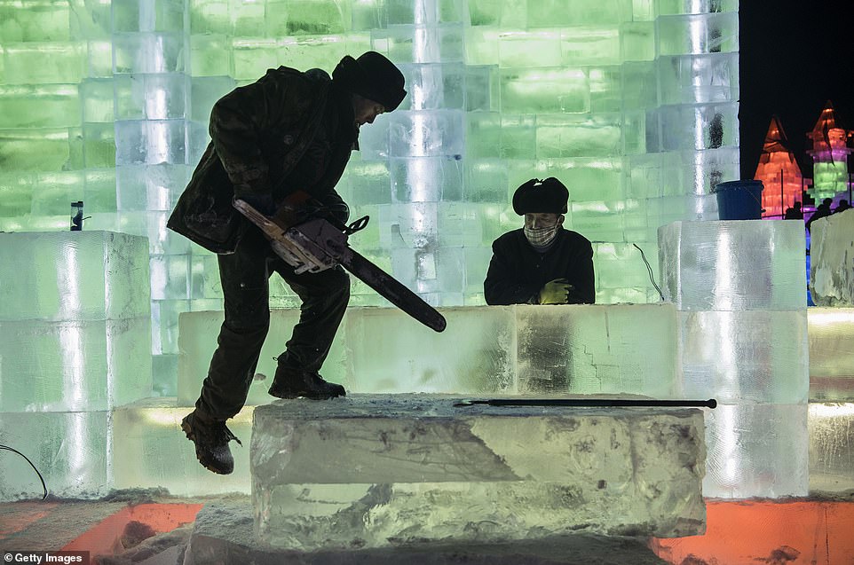 7894976-6535251-image-a-61_1545996928681 Dedication and skills: Dedicated ice artists had 15 intensive working days ahead of the parks soft opening on Sunday