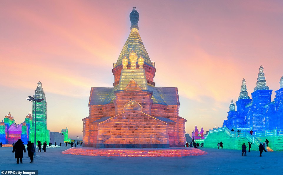 7895016-6535251-image-a-17_1545996388755 Bright lights: The rainbow-coloured winter wonderland normally features iconic landmarks from all over the world