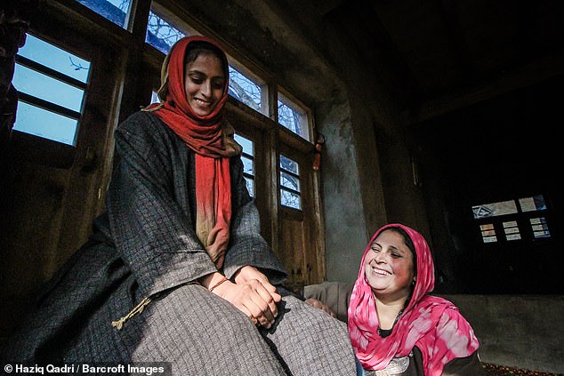 Ms Jan has undergone a few surgeries, including the removal of eight toes. However, they have all so far proved unsuccessful (it is unknown who she is pictured with)