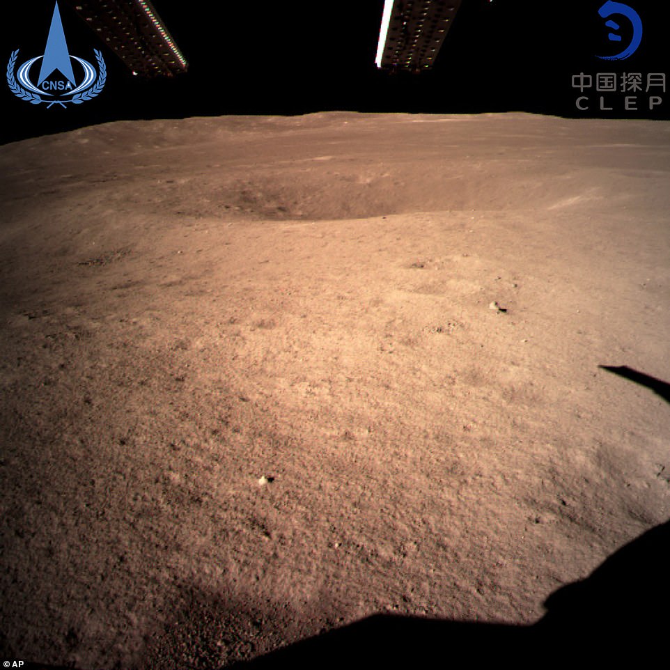 8077154-6551733-a_never_before_seen_close_range_image_taken_by_the_chinese_space-a-14_1546505281976 A never-before-seen 'close range' image taken by the Chinese spacecraft Chang'e-4 of the surface of the far side of the moon. It appears to take on a reddish hue in some of the images released by China, an effect of the lights used by the probe