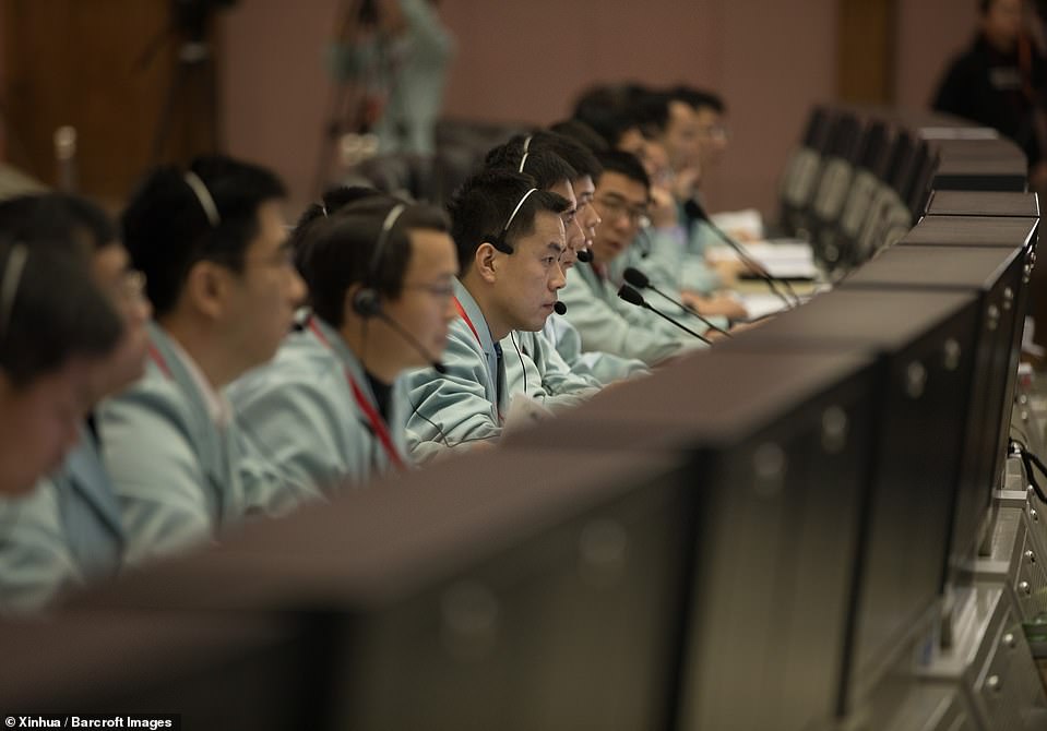 8079946-6551733-technicians_work_at_the_beijing_aerospace_control_center_bacc_in-a-1_1546527035167 Technicians work at the Beijing Aerospace Control Center (BACC) in Beijingto on January 3 make the Chang'e-4 probe landing successful. It touched down on the far side of the moon and in the process became the first spacecraft soft-landing on the moon's uncharted 'dark side' which is never visible from Earth