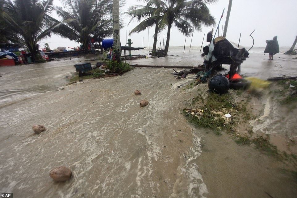 8118094-6556803-floodwaters_rise_over_the_coastal_road_as_tropical_storm_pabuk_a-a-42_1546593450853 Floodwaters rise over the coastal road as Tropical Storm Pabuk approaches in the southern province of Nakhon Si Thammarat, southern Thailand