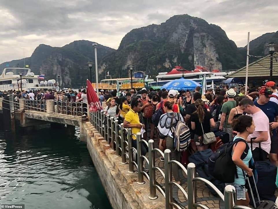 8122916-6556803-image-a-10_1546598989845 Evacuated: Police helped some 1,500 tourists off the island of Koh Phi Phi ahead of the storm's arrival