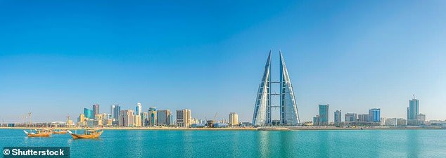 8929098-6626853-kingdom_come_bahrain_epitomized_by_the_futuristic_skyline_of_its-a-10_1548329876012 Kingdom come: Bahrain, epitomized by the futuristic skyline of its capital Manama (pictured), nods to its past by locating largest underwater theme park near pearling World Heritage Site