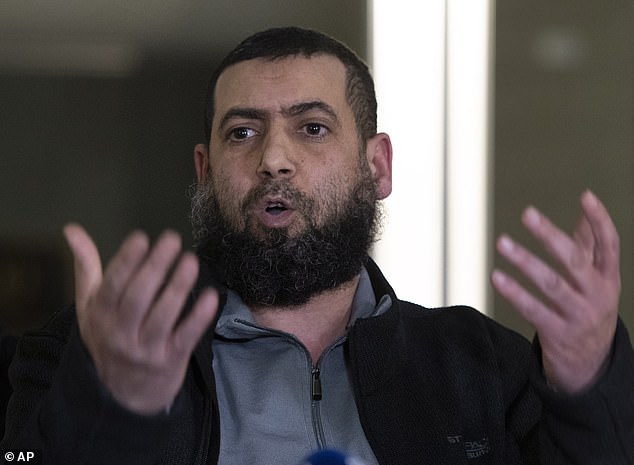 9579152-6684315-image-a-4_1549683549724 Said El-Amari, who was injured during a mosque shooting, reacts as he speaks with reporters Friday, February 8 at the courthouse in Quebec City, following to a judge's sentencing of Alexandre Bissonnette
