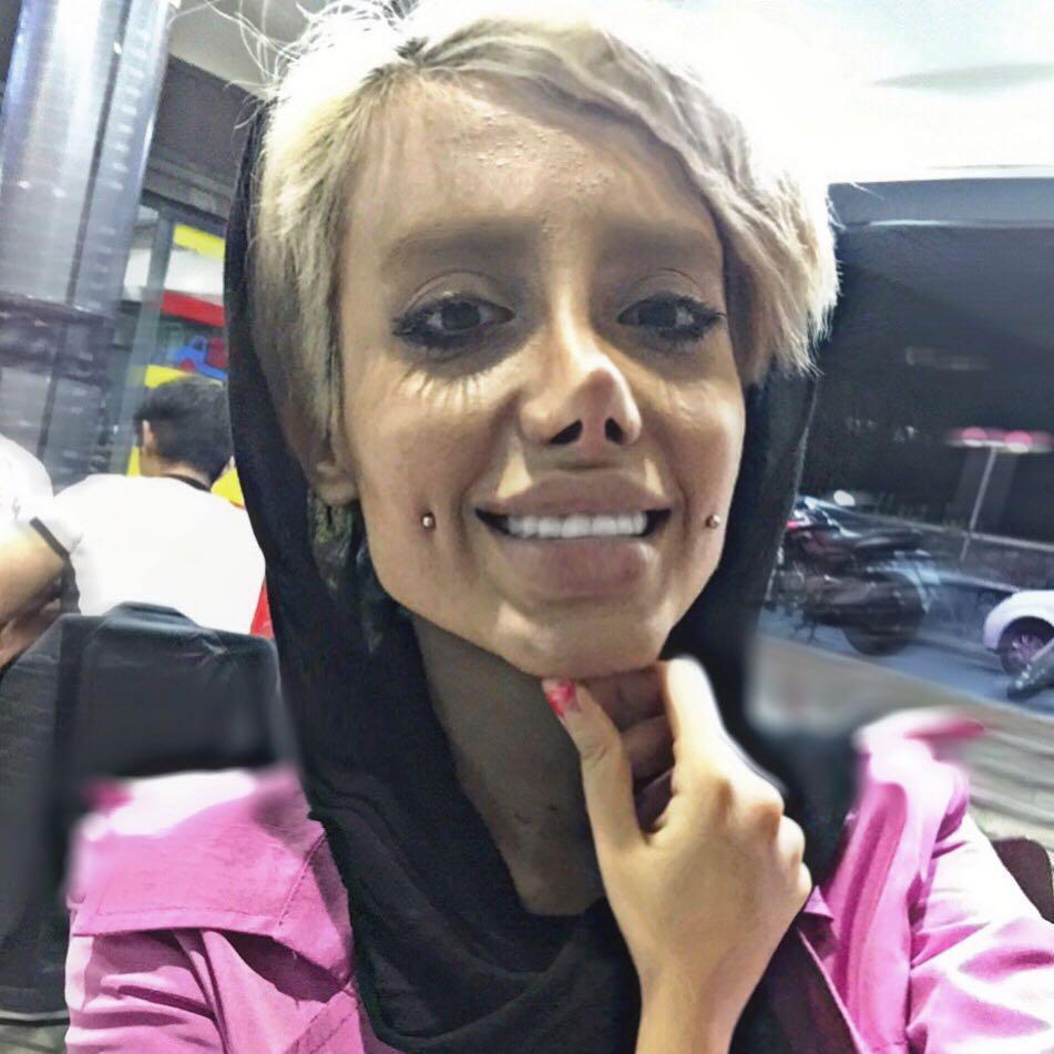 Pictures show her with both brown and blonde hair - and her natural eye colour