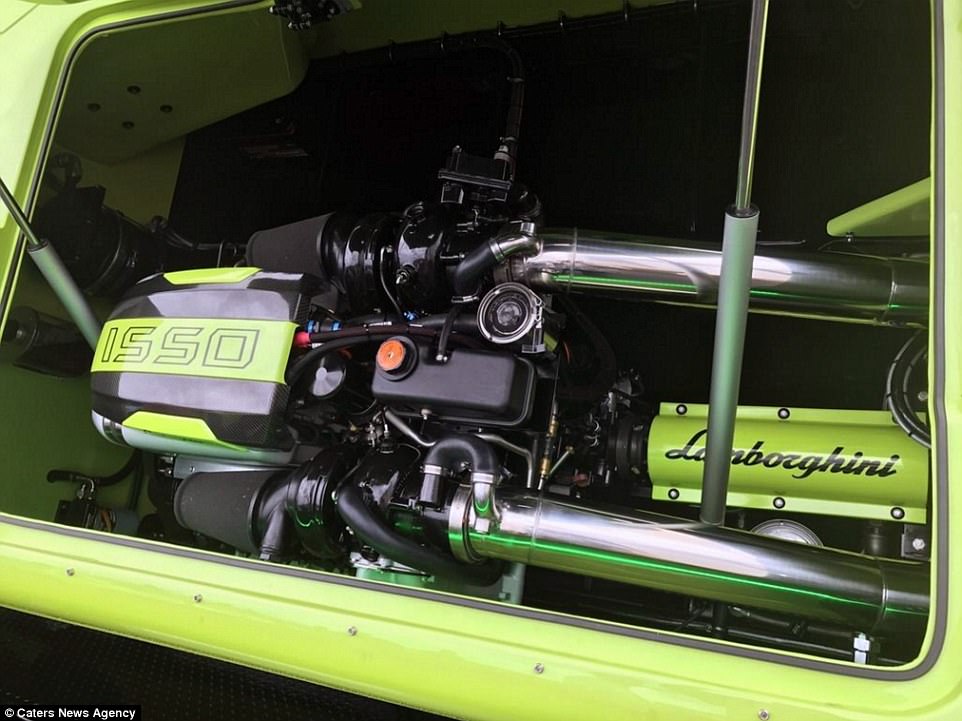 The boat features a switch that toggles between 'race' and 'pleasure' modes. Hydraulic front hatches open to show actual carbon fibre Lamborghini door panels (pictured)