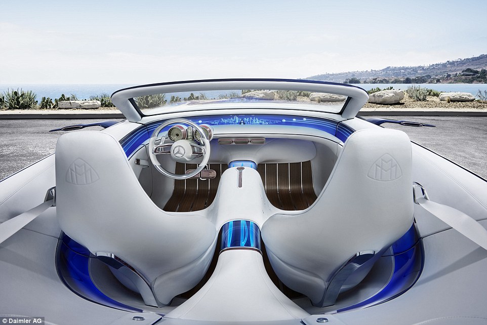 The dashboard has a minimal design and there are barely any buttons in sight. Much of the features are controlled via voice recognition and the driving information is projected onto the windscreen