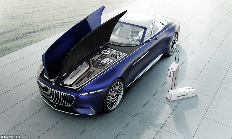 Under the winged bonnet is a storage unit that holds dinner plates, flasks, cutlery, umbrellas and trolley bags