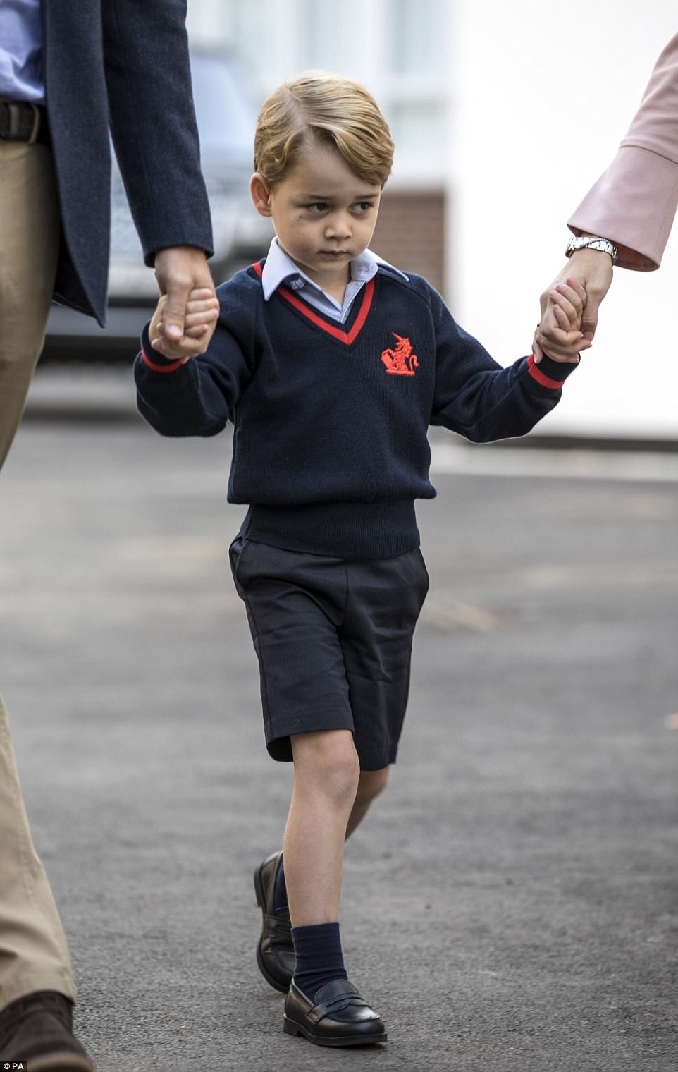 The young royal - as any child would - looked incredibly nervous as he prepared to start his new life at school 