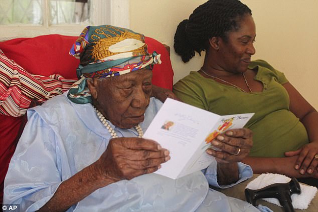 The former plantation worker is pictured at home in Jamaica when she became the world's oldest person in April this year 