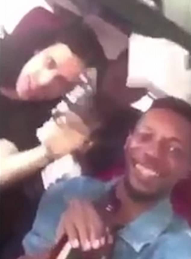 A man appearing to be the Saudi prince waves a gun at the camera as pals laugh