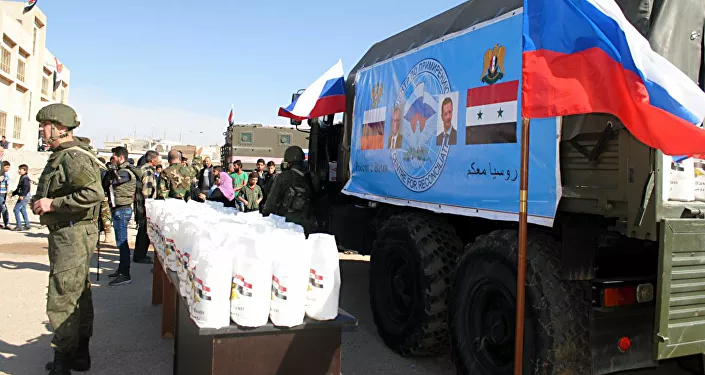 مركز المصالحة الروسي يقدم مئات السلل الغذائية لفقراء إنخل بريف درعا مركز المصالحة الروسي يقدم مئات السلل الغذائية لفقراء إنخل بريف درعا