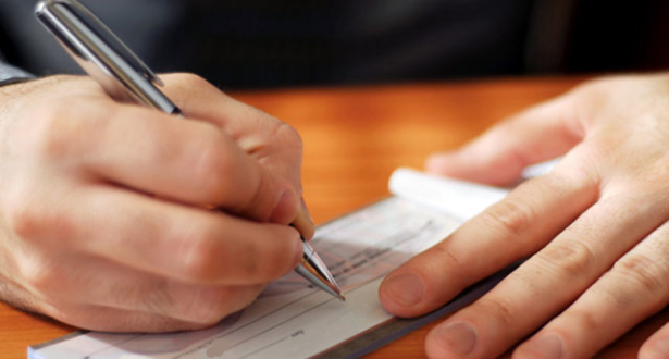 d8b4d98ad983-2 عفو عن 670 ألف ممنوع من الشيك في قانون مالية 2020