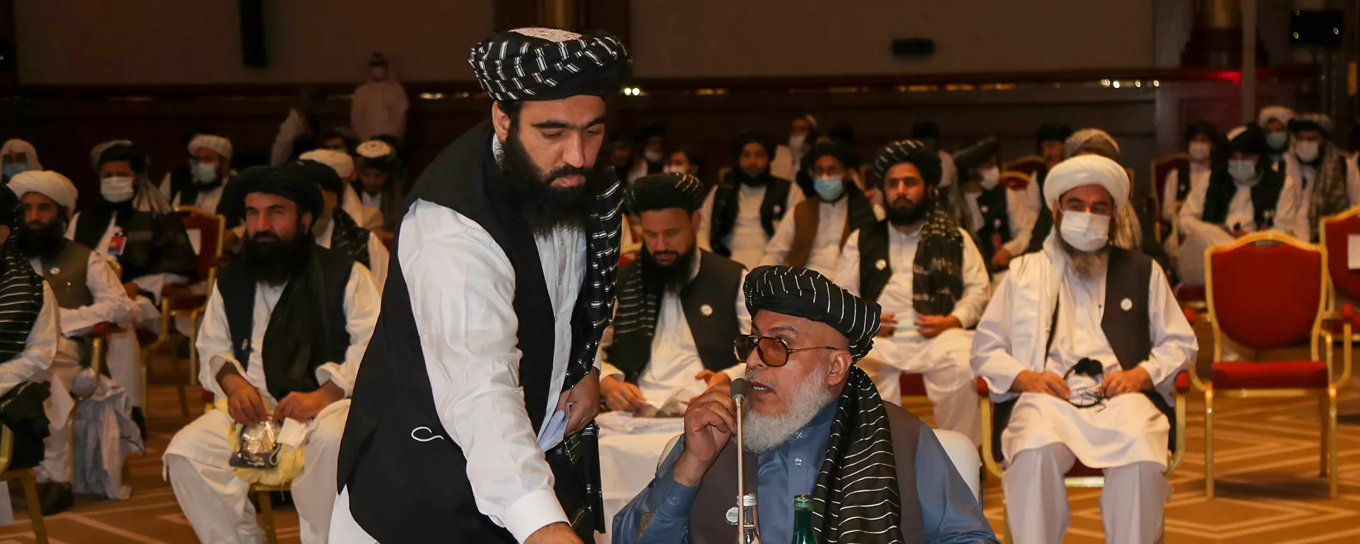 الجلسة الافتتاحية لمفاوضات السلام بين الحكومة الأفغانية وحركة طالبان، المنعقدة في الدوحة، قطر 12سبتمبر 2020 - سبوتنيك عربي, 1920, 13.07.2021