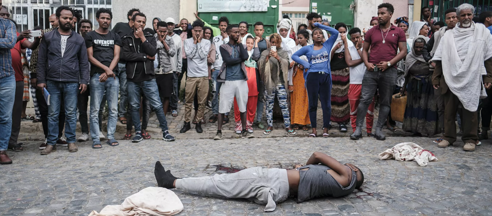 جثة شاب قال شهود إن الأمن أطلق عليه النار لخرقه حظر التجول في ميكيلي- تيغراي في 27 فبراير 2021. - سبوتنيك عربي, 1920, 26.05.2021