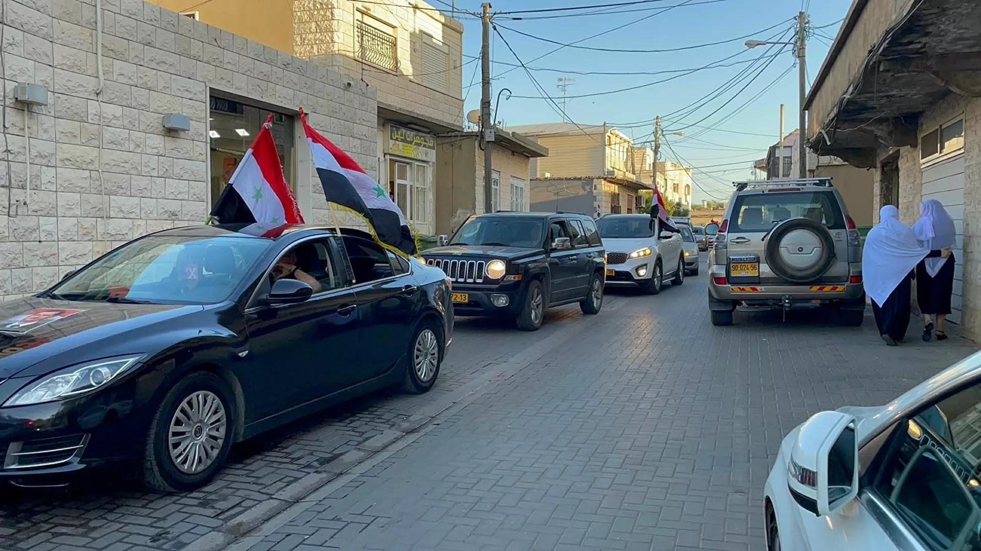 أهالي الجولان المحتل يقترعون على طريقتهم في الانتخابات الرئاسية السورية - سبوتنيك عربي, 1920, 26.05.2021