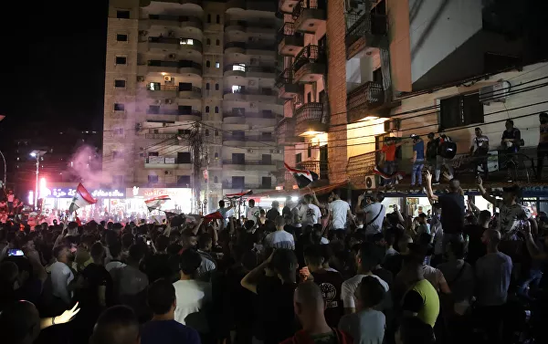 احتفالات في شوارع طرابلس بفوز بشار الأسد بالرئاسة السورية، لبنان 27 مايو 2021 احتفالات في شوارع طرابلس بفوز بشار الأسد بالرئاسة السورية، لبنان 27 مايو 2021 - سبوتنيك عربي