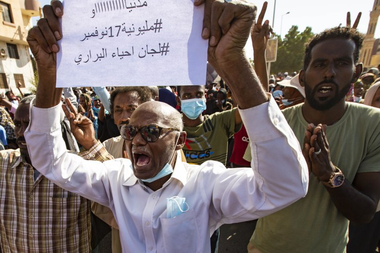 26142413-3 Hundreds rally in Sudan to protest military takeover