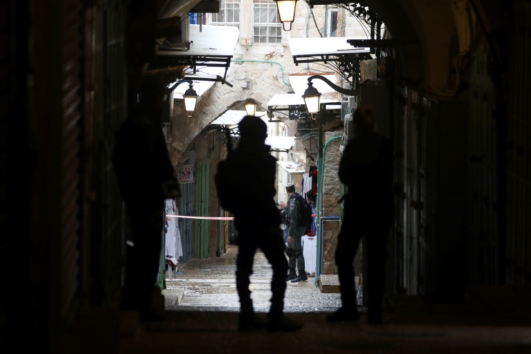 Israeli security personnel secure the scene following an incident in Jerusalem's Old City