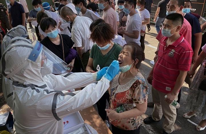 بكين تغلق المدارس لاحتواء كورونا