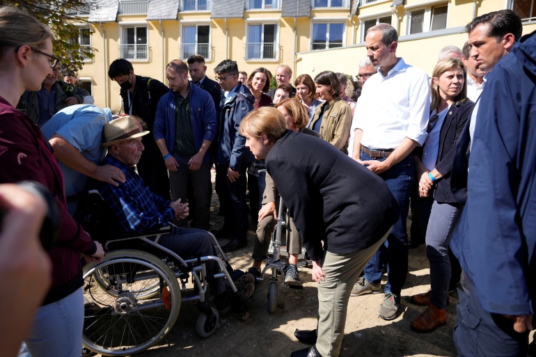 Merkel checks up on progress in areas hit by deadly floods