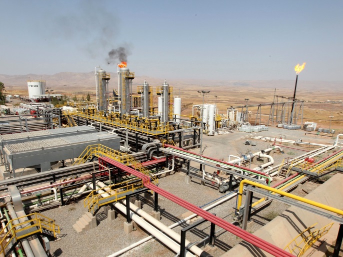0a81fcc8-e53f-4010-b0d5-8d1297dc13cb A flame rises from a chimney at Taq Taq oil field in Arbil, in Iraq's Kurdistan region, August 16, 2014. REUTERS/Azad Lashkari/File Photo