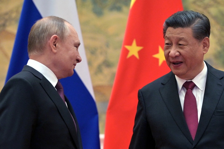 rts54um4-1 Russian President Putin meets Chinese President Xi in Beijing