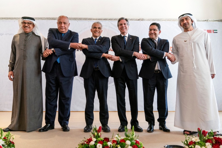 Bahrain's Foreign Minister Abdullatif bin Rashid al-Zayani, Egypt's Foreign Minister Sameh Shoukry, Israel's Foreign Minister Yair Lapid, U.S. Secretary of State Antony Blinken, Morocco's Foreign Minister Nasser Bourita and United Arab Emirates' Foreign Minister Sheikh Abdullah bin Zayed Al Nahyan pose for a photograph during the Negev Summit in Sde Boker, Israel March 28, 2022. Jacquelyn Martin/Pool via REUTERS