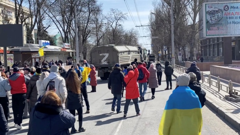 'Go home' - Protestors confront Russian military vehicles in Kherson