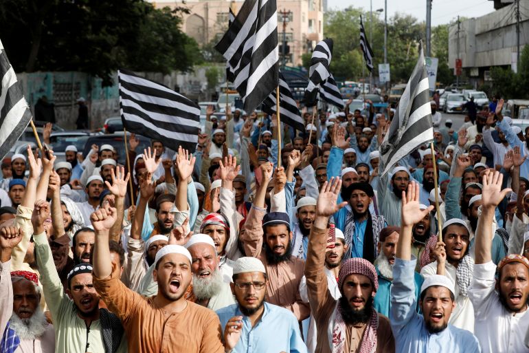 rts8gctq-1 Supporters of the Jamiat Ulema-e-Islam-Fazal (JUI-F) religious and political party chant slogans during a protest in Karachi