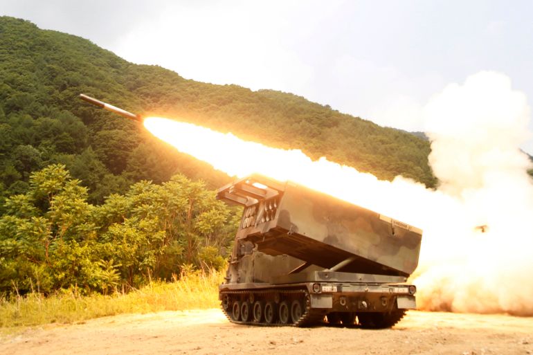 rtr33grr-1 A rocket is launched from M-270A1 MLRS during a combined rocket live fire training exercise in Cheorwon
