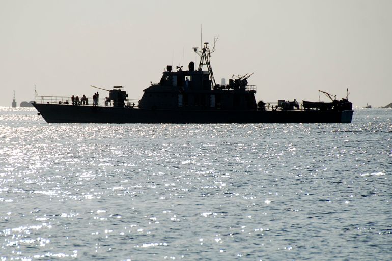 rtr3bccj-1 One of two Iranian navy warships arrives to dock at Port Sudan in the Red Sea state