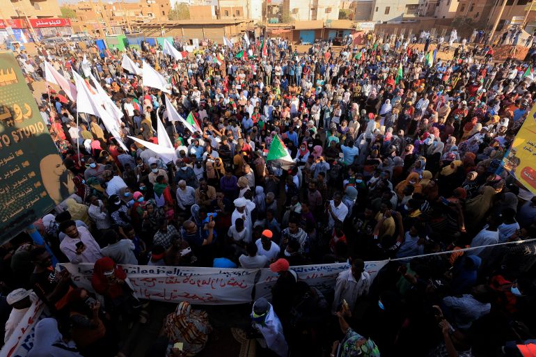 rts4tb77-1 People attend a protest rally in Khartoum