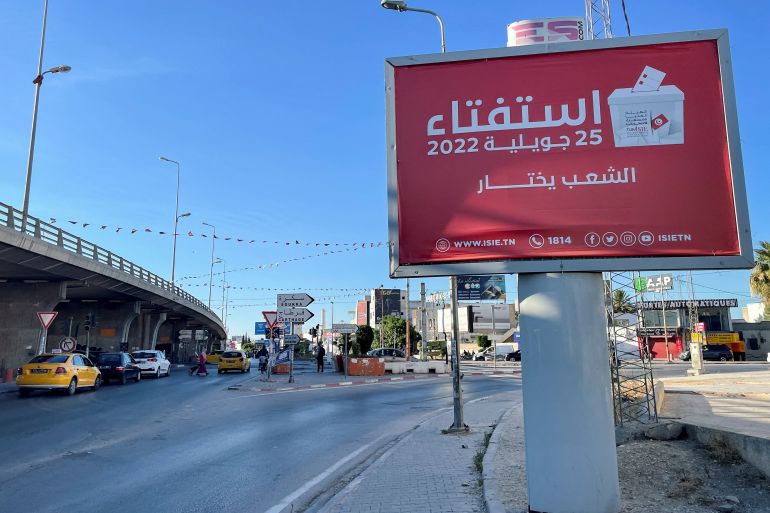 rts9nmit-1 A view shows a campaign billboard for an upcoming referendum on a new constitution, in Tunis