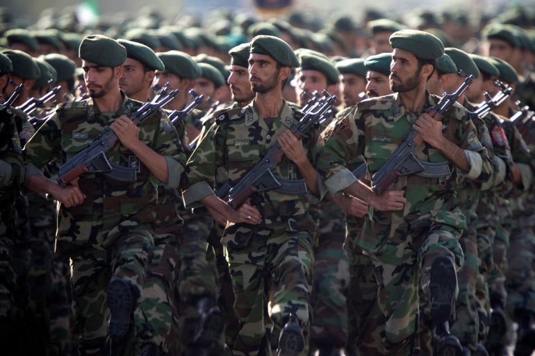 rtx2o26d-1 Members of Iran's Revolutionary Guards march during a military parade to commemorate the 1980-88 Iran-Iraq war in Tehran