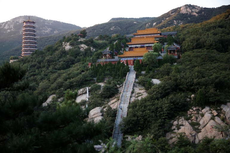 The Wider Image: Taoist priest honours China's coronavirus dead with memorial tablets